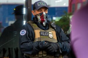 Masks on ICE agents ignite pushback. When can officials block their faces? – The Christian Science Monitor