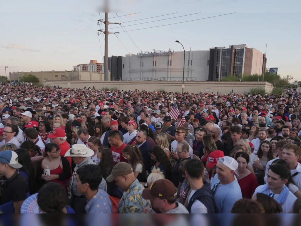 Man armed with gun and knife arrested at Charlie Kirk memorial service venue – The Guardian